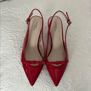 Morgan Taylor patent kitten heel slings.